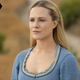 Dolores, in her blue prairie dress, stares out at Westworld.